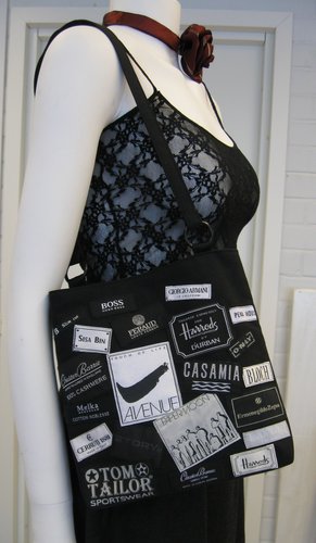 "Merkillinen" olkalaukku 1